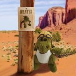 zöld dino szeműveg-és sapkával 24cm